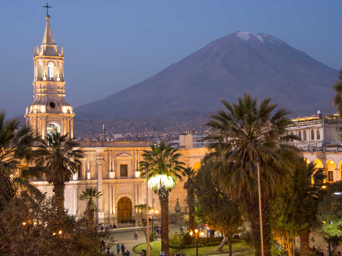 Iconic view of Arequipa Basilica and Misti Volcano after sunset